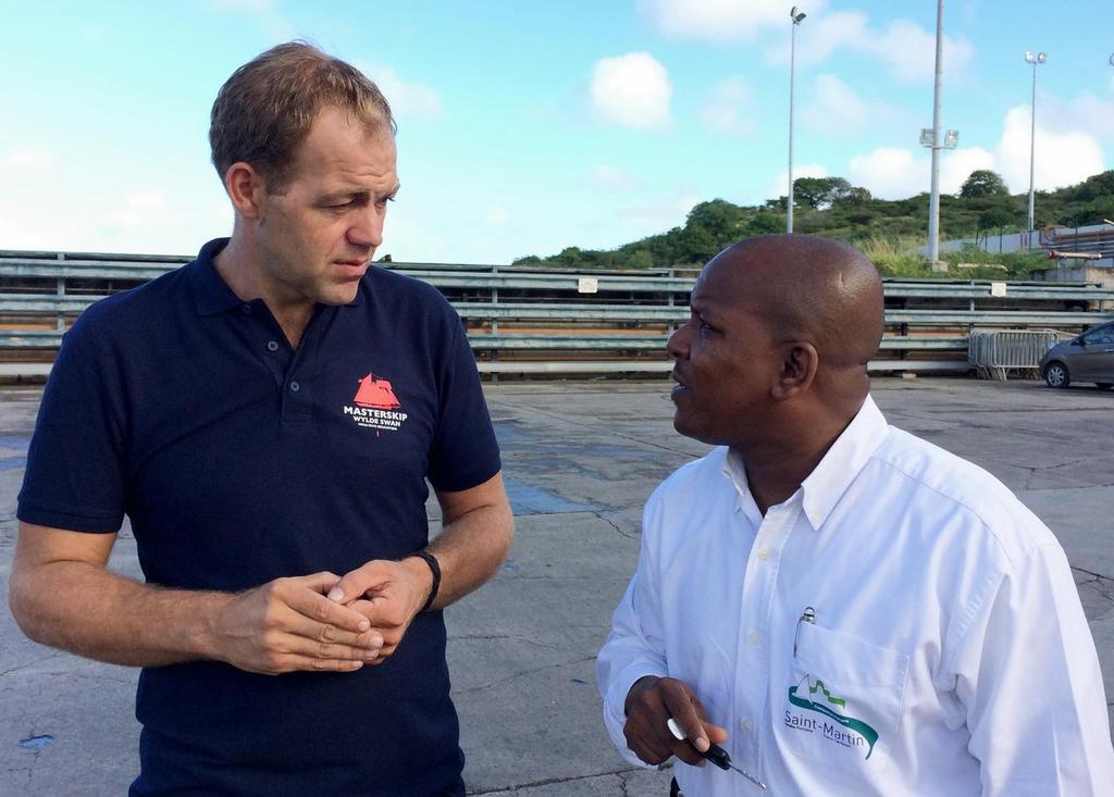 Director of the Port de Marigot-Galisbay Mr. Alberic Ellis discussing some logistics with Captain Fosse Fortuin © Caribbean Sail Training Association http://www.caribbeansailtrainingassociation.org/